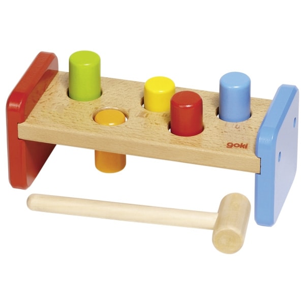Wooden hammer bench with colorful pegs and mallet