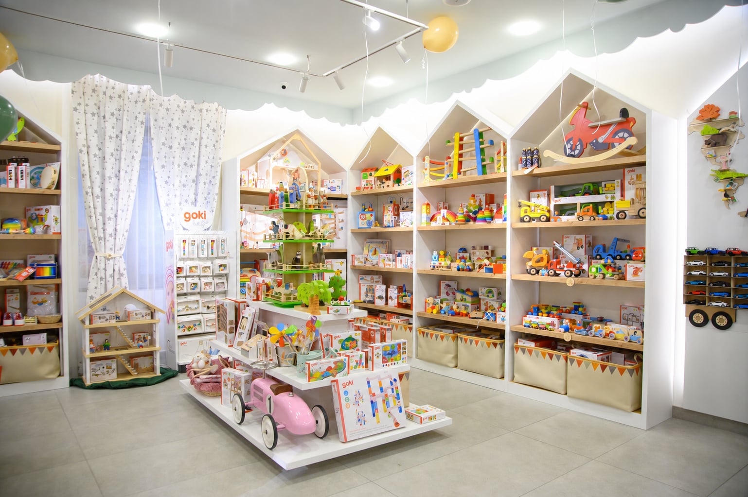 Wooden toy display shelves inside the shop